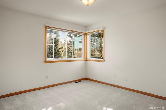 view of carpeted spare room