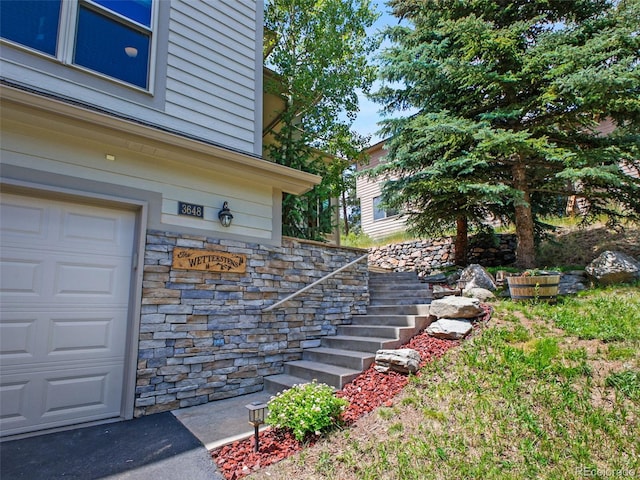 3648 Heatherwood Way, Evergreen, CO 80439 - entrance to property with stone siding