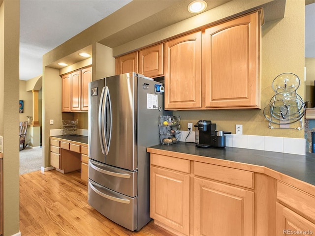 3648 Heatherwood Way, Evergreen, CO 80439 - kitchen with freestanding refrigerator, dark countertops, light wood-type flooring, recessed lighting, and light brown cabinets