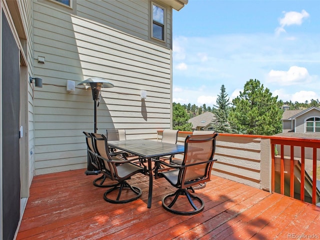 3648 Heatherwood Way, Evergreen, CO 80439 - wooden deck featuring outdoor dining area