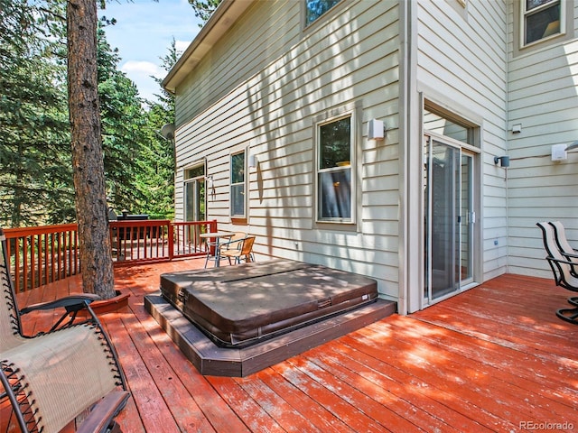 3648 Heatherwood Way, Evergreen, CO 80439 - wooden terrace with a covered hot tub