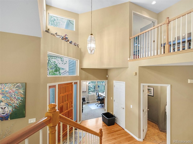 3648 Heatherwood Way, Evergreen, CO 80439 - foyer entrance with a high ceiling and wood finished floors