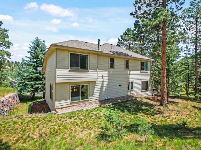 3648 Heatherwood Way, Evergreen, CO 80439 - rear view of property with a yard