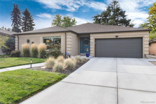 single story home featuring a front yard and a garage