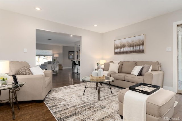 living room featuring dark hardwood / wood-style floors