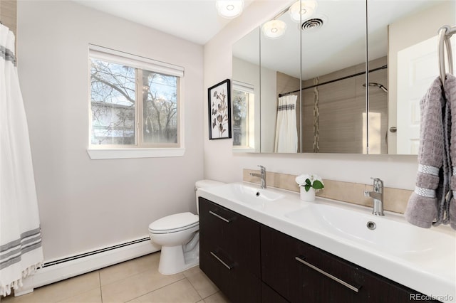 bathroom featuring toilet, a baseboard heating unit, tile patterned flooring, and vanity