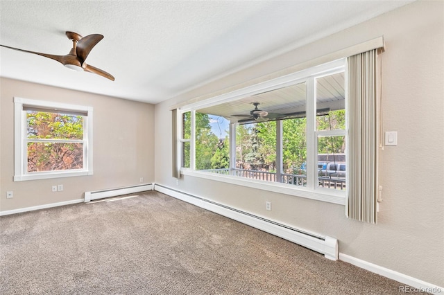 6150 Reed St, Arvada, CO 80003 - carpeted spare room featuring a ceiling fan, baseboards, and a baseboard radiator