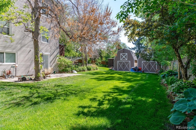6150 Reed St, Arvada, CO 80003 - view of yard featuring a barn and an outdoor structure