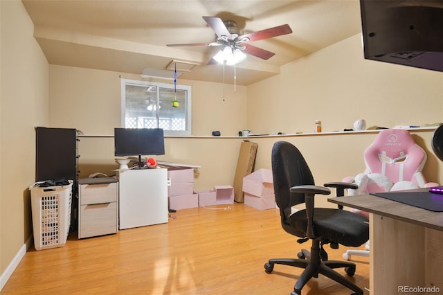 home office with attic access, baseboards, ceiling fan, and wood finished floors