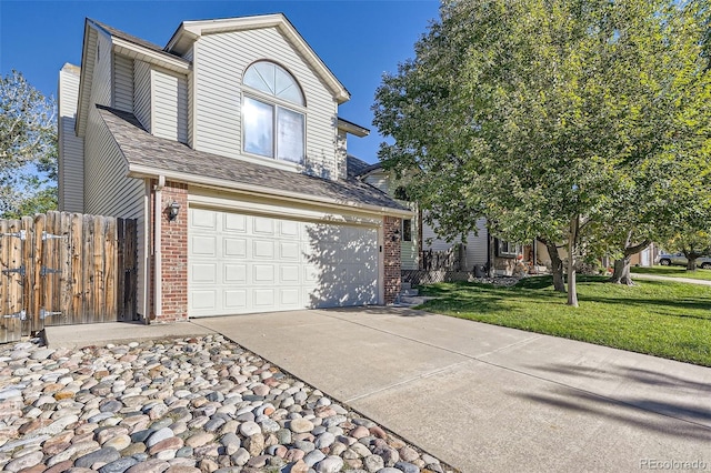 front facade with a front yard and a garage