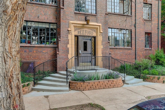 1060 N Washington St Unit 1A, Denver, CO 80203 - doorway to property with brick siding
