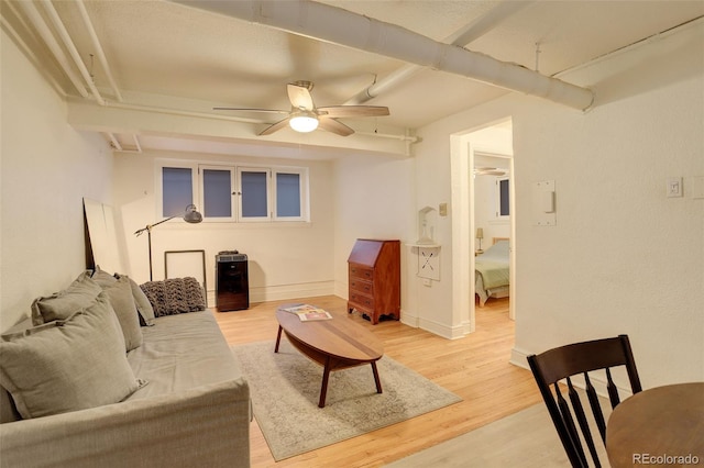 1060 N Washington St Unit 1A, Denver, CO 80203 - living room with a ceiling fan and light wood-style flooring