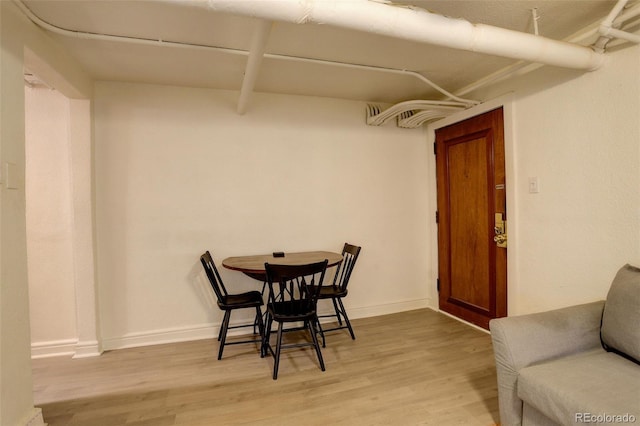 1060 N Washington St Unit 1A, Denver, CO 80203 - dining space with light wood-type flooring and baseboards