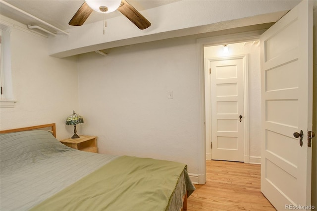 1060 N Washington St Unit 1A, Denver, CO 80203 - bedroom featuring light wood finished floors and a ceiling fan