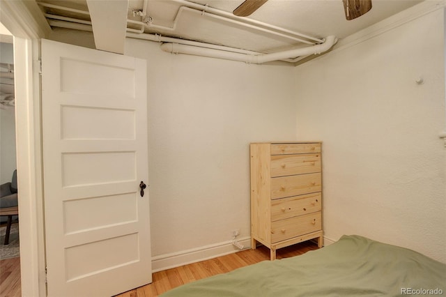 1060 N Washington St Unit 1A, Denver, CO 80203 - bedroom with light wood finished floors and baseboards