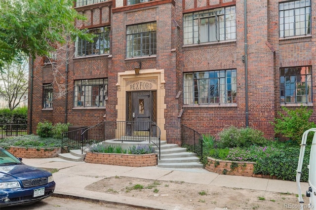 1060 N Washington St Unit 1A, Denver, CO 80203 - view of front of home with brick siding