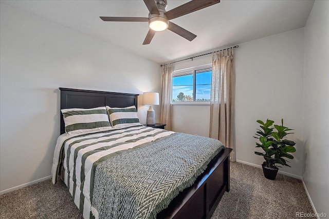 bedroom featuring carpet, baseboards, and a ceiling fan