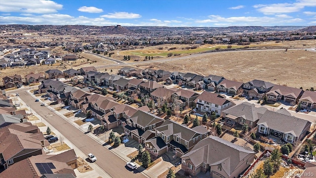 birds eye view of property with a residential view