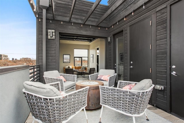2442 Champa St, Denver, CO 80205 - view of patio featuring an outdoor living space with a fire pit and a balcony