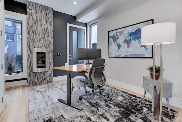 2442 Champa St, Denver, CO 80205 - office space featuring wood finished floors, baseboards, a fireplace, and recessed lighting