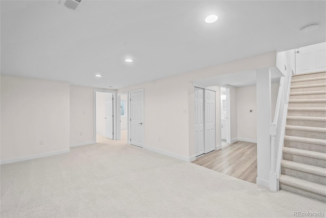 empty room with light colored carpet