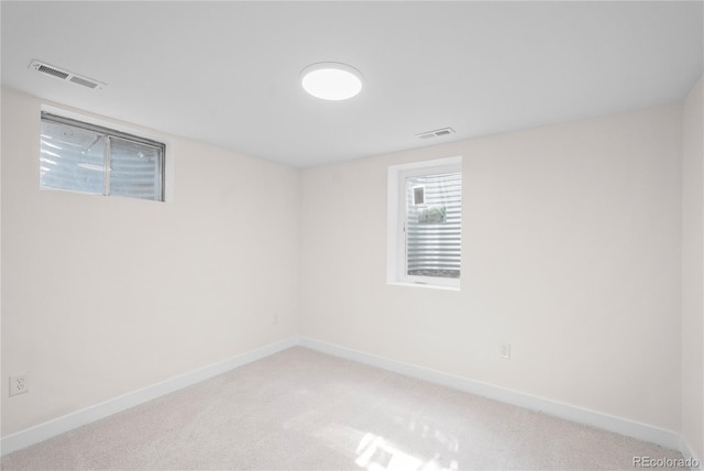 unfurnished room with carpet floors