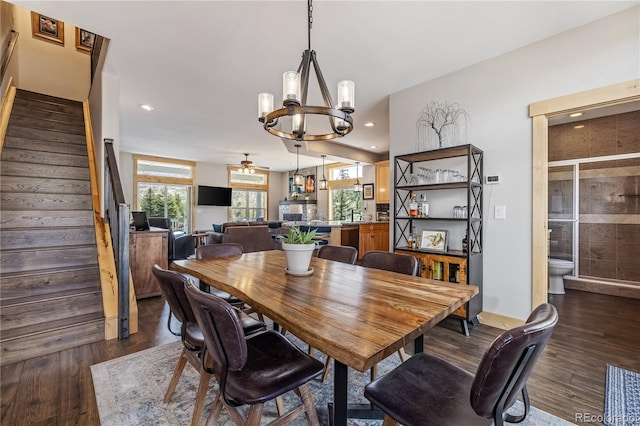133 Creek Ln, Silverthorne, CO 80498 - dining room featuring a chandelier, stairway, dark wood-type flooring, and recessed lighting