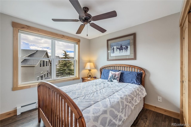 133 Creek Ln, Silverthorne, CO 80498 - bedroom featuring a baseboard radiator, wood finished floors, and a ceiling fan