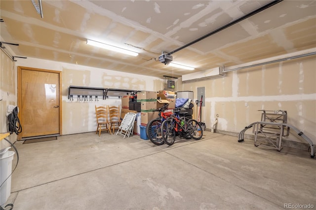133 Creek Ln, Silverthorne, CO 80498 - garage with electric panel and a garage door opener