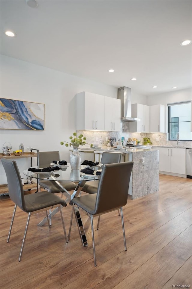 dining area featuring light hardwood / wood-style flooring