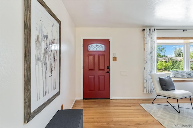 5593 E Center Ave, Denver, CO 80246 - entryway featuring light wood-style flooring and baseboards