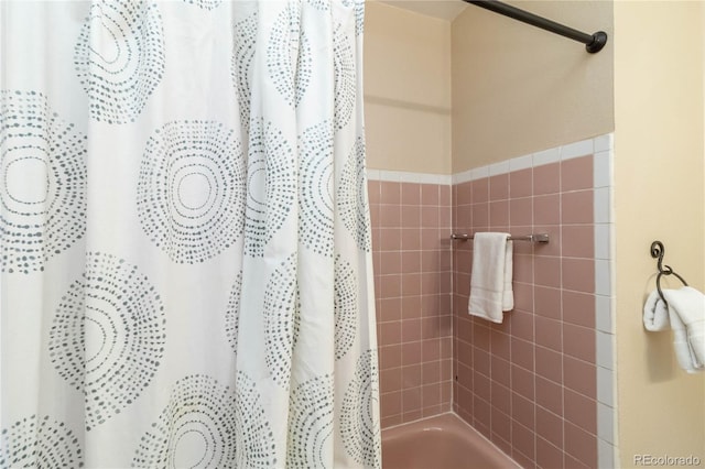 5593 E Center Ave, Denver, CO 80246 - bathroom featuring shower / bath combo