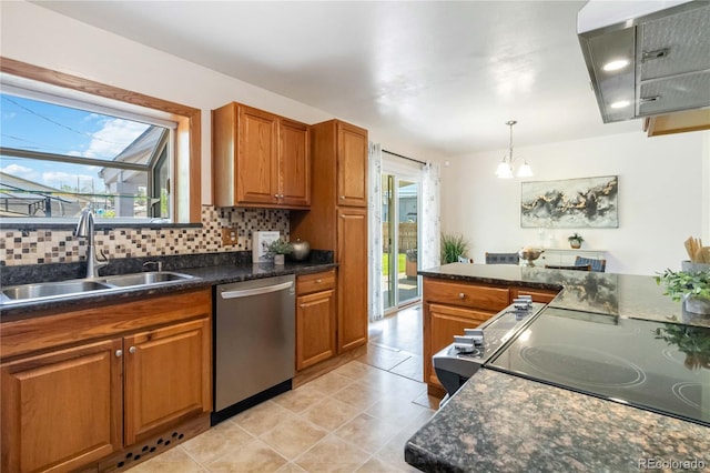 5593 E Center Ave, Denver, CO 80246 - kitchen with stainless steel dishwasher, a sink, a chandelier, dark countertops, and brown cabinets