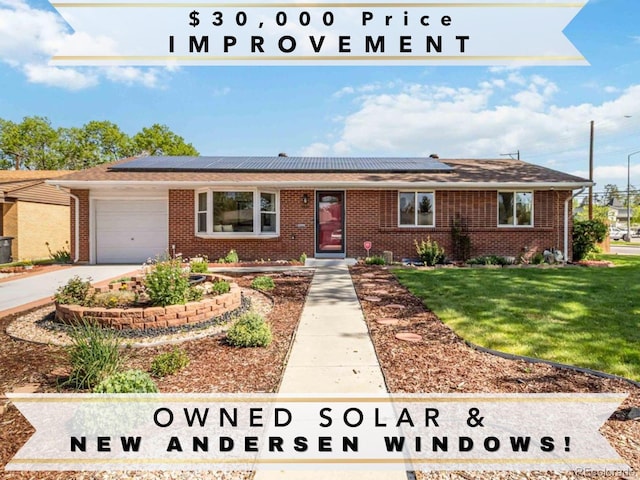 5593 E Center Ave, Denver, CO 80246 - view of front of property with brick siding, a front yard, an attached garage, and roof mounted solar panels