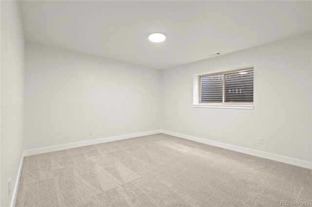 view of carpeted spare room