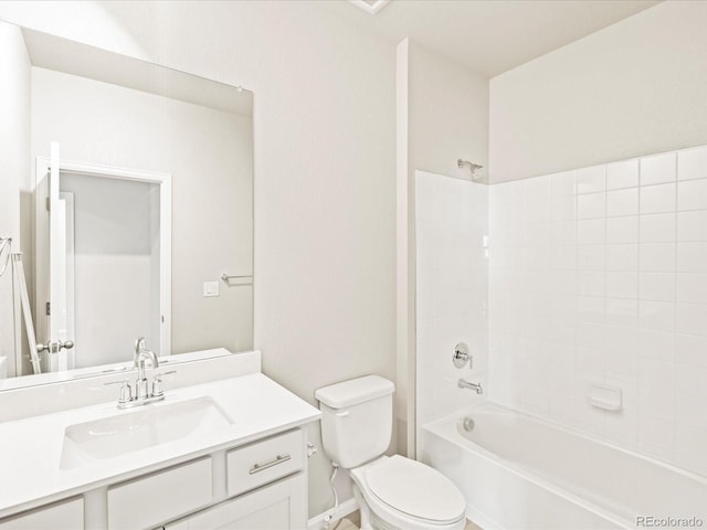bathroom with baseboards, vanity, shower / tub combination, and toilet