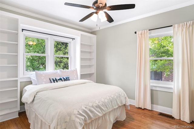 1767 S Sherman St, Denver, CO 80210 - bedroom featuring wood finished floors, baseboards, ornamental molding, and ceiling fan