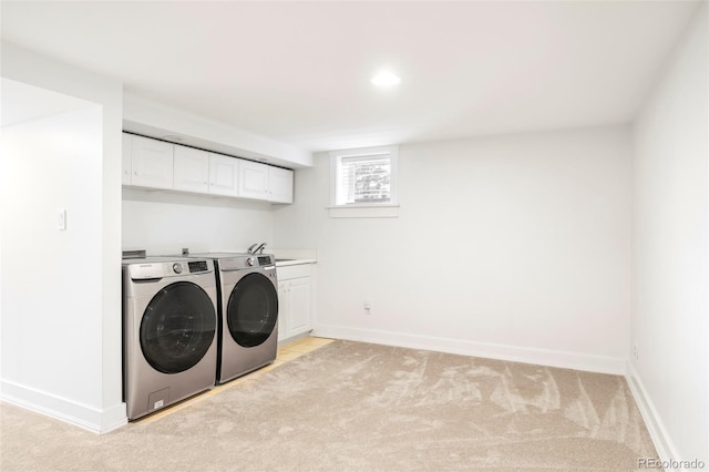 1767 S Sherman St, Denver, CO 80210 - washroom featuring washing machine and clothes dryer, cabinet space, light carpet, baseboards, and recessed lighting