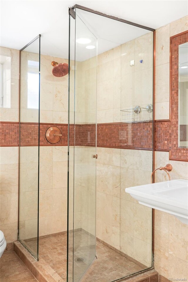 1767 S Sherman St, Denver, CO 80210 - bathroom with a stall shower, toilet, and tile walls