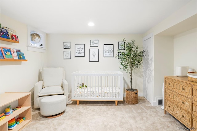 1767 S Sherman St, Denver, CO 80210 - carpeted bedroom with a crib and recessed lighting