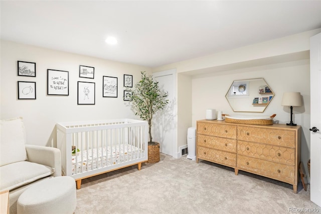 1767 S Sherman St, Denver, CO 80210 - bedroom with a crib and light colored carpet