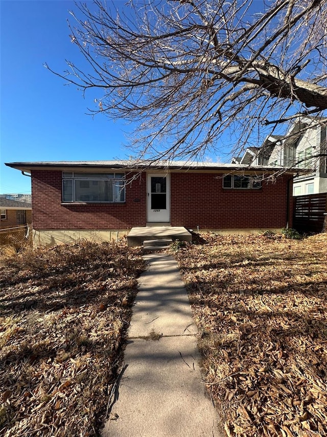 1265 Yates St, Denver, CO 80204 - ranch-style house featuring brick siding