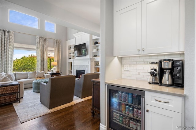 6175 Puma Sands, Lone Tree, CO 80124 - indoor dry bar featuring wine cooler, healthy amount of natural light, and dark wood-type flooring