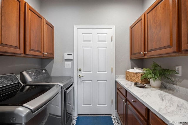 6175 Puma Sands, Lone Tree, CO 80124 - laundry area featuring cabinet space and washing machine and dryer