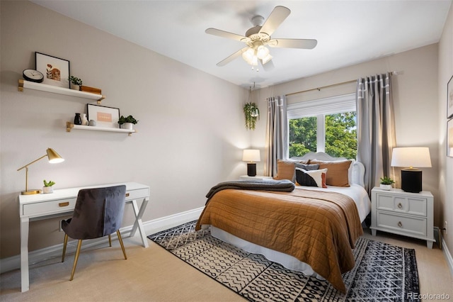 6175 Puma Sands, Lone Tree, CO 80124 - bedroom with baseboards, light colored carpet, a desk, and a ceiling fan
