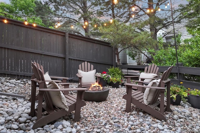 6175 Puma Sands, Lone Tree, CO 80124 - view of patio / terrace with an outdoor fire pit