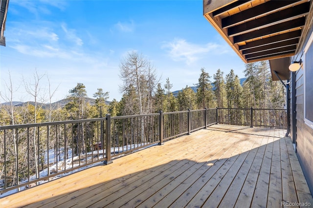 wooden terrace featuring a mountain view