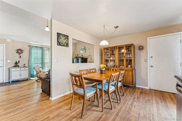 dining room with light hardwood / wood-style flooring