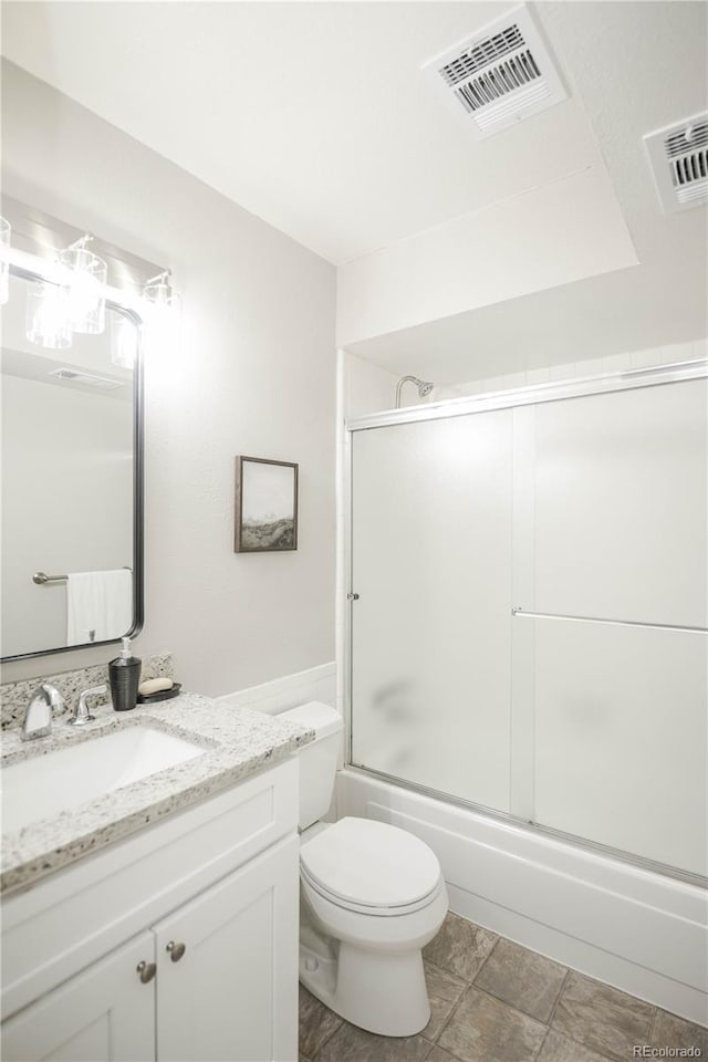 3855 S Monaco St Unit 208, Denver, CO 80237 - bathroom with vanity and enclosed tub / shower combo