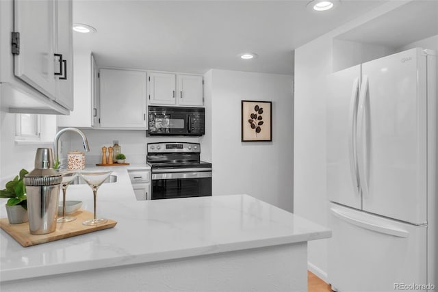 4248 Corriente Pl, Boulder, CO 80301 - kitchen featuring freestanding refrigerator, black microwave, stainless steel electric range oven, a sink, and recessed lighting